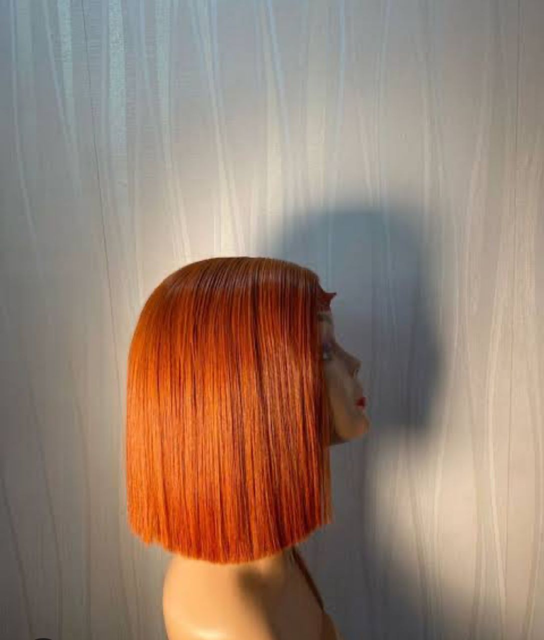 Premium orange colored straight wig